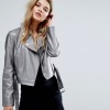 Women's eco-leather jacket with patches and crystals